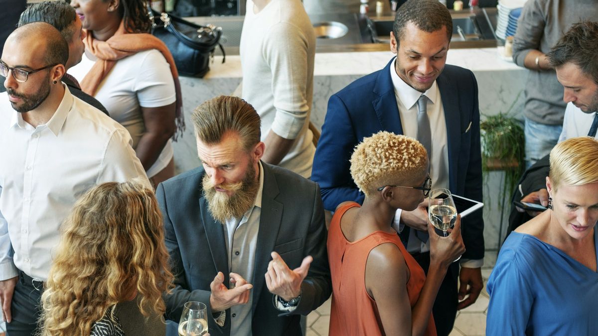 People talking at a business event